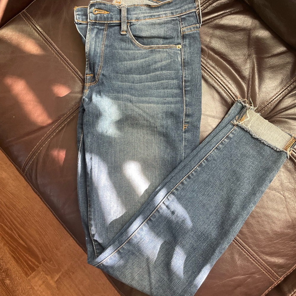 Size 24 Frame skinny jeans. Frayed at bottoms